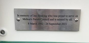 Memorial plaque in memory of Jan Hoskins who was proud to serve on Melton's Parish Council and is missed by all. 8 March 1942 - 24 September 2021