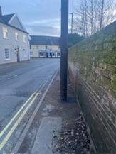 Pole on Yarmouth Road in middle of pavement